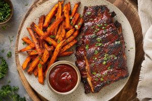 Homemade BBQ Ribs With Sweet Potato Fries: 42g Protein Per Serving